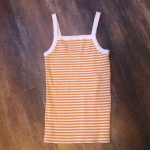 white and yellow tank top